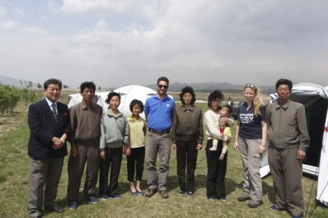 ShelterBox response team members Alice Jefferson and Sam Hewett (both from the UK) with recipients of ShelterBox aid in the Democratic People’s Republic of Korea.